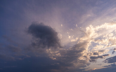 Beautiful sunset sky, with clouds, after rain. Evening sky background.