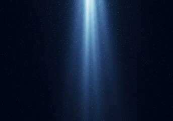 Obraz premium Blue light beam shining down in dark space background concept for wallpaper and graphic design element use