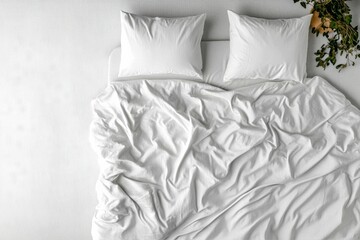 Obraz premium Soft White Bedding With Neatly Arranged Pillows on a Rumpled Bedspread in a Cozy Bedroom.