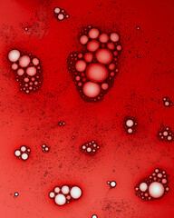 Clear red cosmetic gel serum oil bubble texture background hyaluronic skin moisturizing hydrating product sample with bubbles macro