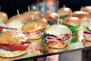 Delicious mini baguette with ham, lettuce and cheese