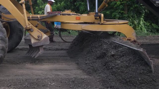 Busy construction site India. Heavy equipment and industrial machinery like bulldozer, compactor, pavers work on road and highway development, complete street maintenance for urban infrastructure