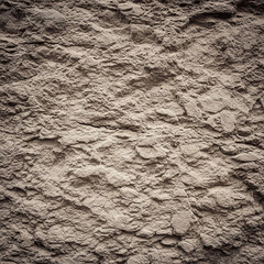 light brown gray rocky stone wall grunge abstract background