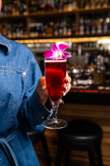 Cocktail in hand