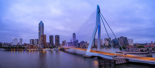 Panoramic view of Erasmus Erasmusbrug bridge in Rotterdam . Financial business district skyline.