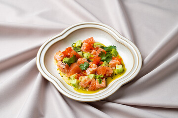 Savory bits of salmon mixed with crisp cucumbers and topped with vibrant garnishes create a beautiful dish. Perfect for a light meal or appetizer showcasing freshness and flavor