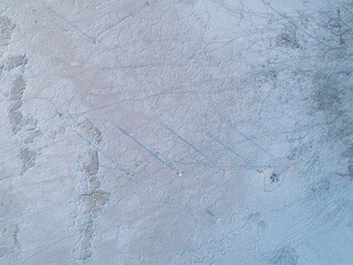 Aerial view of two people walking on the dry lakebed of Carrizo Plain National Monument,...