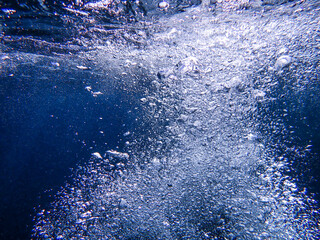 Air bubbles underwater rising to water surface, natural scene, bubbles under water, bubble...