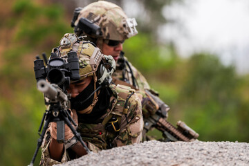 Special Forces Soldiers Armed and Ready During Tactical Training – Focused Military Men in...