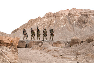 Special Forces Team Standing Together in Desert Mountain Terrain – Tactical Soldiers in Full Gear...