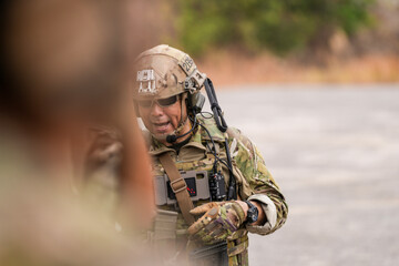 Special Forces Soldiers Armed and Ready During Tactical Training – Focused Military Men in...
