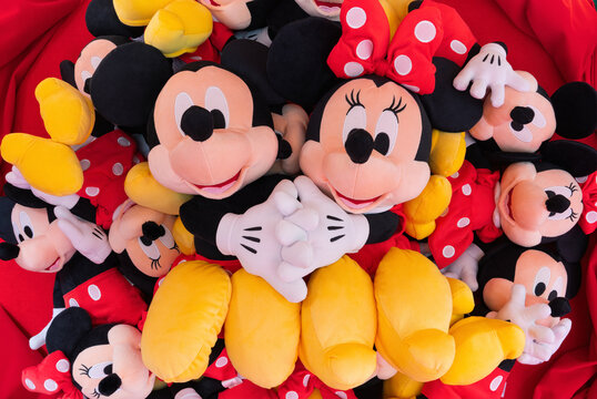 tokyo, ikebukuro - apr 16 2025: A bunch of Japanese Mickey Mouse and Minnie Mouse plush toys with various sizes showcasing popular Disney characters in a colorful and playful manner.