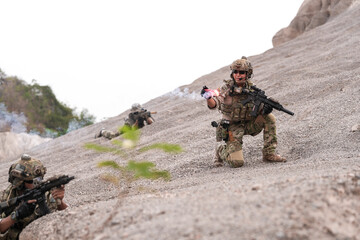 Special Forces Soldier Standing in Smoke During Tactical Operation &ndash; Full Combat Gear with Rifle and Helmet in Action Scene, Military Training or Battlefield Simulation Environment