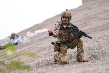 Special Forces Soldier Standing in Smoke During Tactical Operation – Full Combat Gear with Rifle...