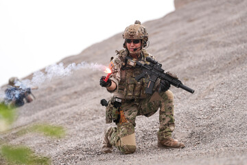 Special Forces Soldier Standing in Smoke During Tactical Operation – Full Combat Gear with Rifle and Helmet in Action Scene, Military Training or Battlefield Simulation Environment