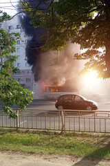 Burning bus in the city