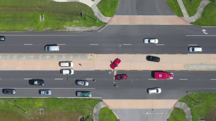 Car accident on highway road in Florida. Emergency services personnel helping victims of vehicle crash on city street in USA.