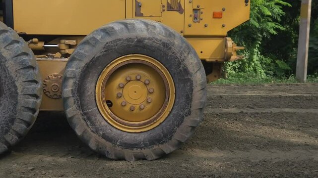 Busy construction site , heavy equipment and industrial machinery like bulldozers, excavators, loaders, compactors, steamrollers, and pavers work on road and highway development. Indian transportation