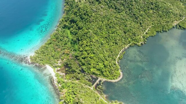 Top view of lagoons and bays with turquoise water among the islands. Weh Island. Indonesia.