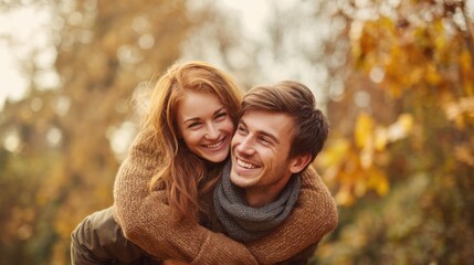 Fototapeta premium A man is carrying a woman on his back