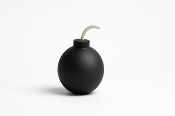 白い背景に置かれたシンプルな黒い爆弾