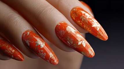 Woman hand with stylish manicure. Orange, gold colors nail polish design with autumn forest themed illustration, holding autumn leaf. Perfect for beauty salon promotion, seasonal nail art, october