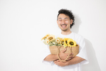 Middle-aged man with sunflower Bright fun uncle