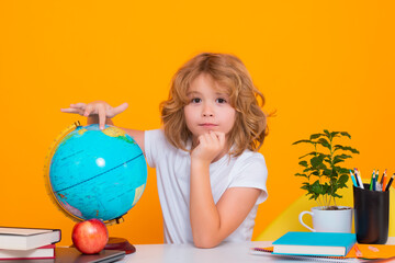 School child portrait isolated on yellow studio background. Kid boy from elementary school. Pupil go study. Clever schoolboy learning. Kids study, knowledge and education.