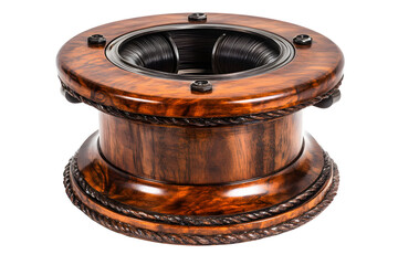 Elegant wooden thread spool with intricate detailing against a black backdrop
