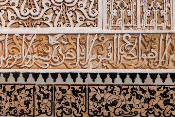 Scenic view of ornate architectural detail in Madrasa Ben Youssef mosque in the Old Town Medina area of Marrakech, west Morocco 