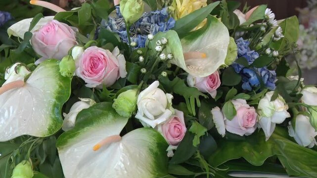 pink and white rose flower bouquet in ceremony