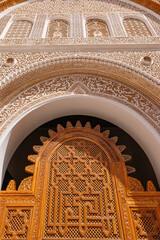 Scenic view of ornate architectural detail in Madrasa Ben Youssef mosque in the Old Town Medina area of Marrakech, west Morocco 