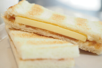 Toasted bread with melted cheese and jam filling