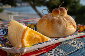 Italian provolone cheese made with fresh oranges, Sicilian cheese and traditional burrata shaped...