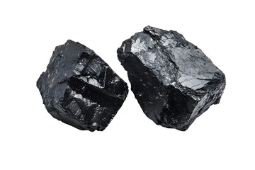 Two pieces of natural coal isolated on a black background, fuel industry