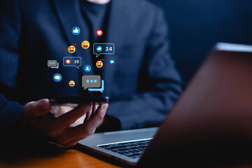 Social media and digital online, man using smart phone use social media network application, Friend reply chat concept or send emoticon for react feeling, playing Social media Distancing.