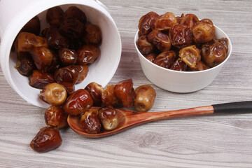 dates in a wooden bowl