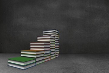 Steps made from books in grey room