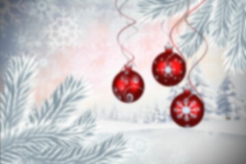 Baubles hanging over christmas scene