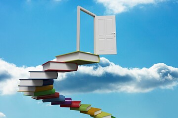 Fototapeta premium Book steps leading to door against sky