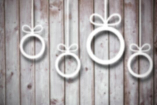 Fototapeta Blurred christmas decorations on wood