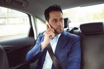 Businessman call in a car