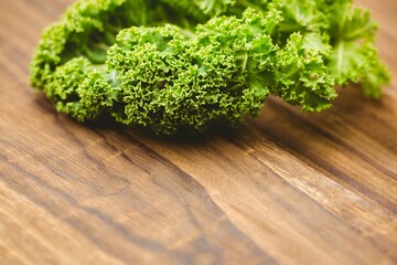 Close-up of parsley on wooden board