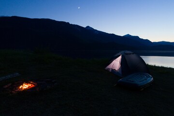 Tent standing beside lake