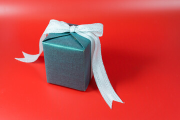 minimal flat lay chinese new year decoration item and gift box on red background