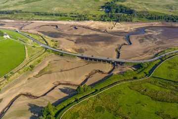 Aerial view of a dramatically low Woodhead Reservoir during drought conditions, The reservoir, part...