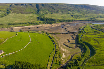 Aerial view of a dramatically low Woodhead Reservoir during drought conditions, The reservoir, part...