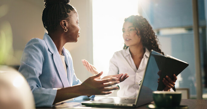 Business, women and talk with laptop in office for planning, finance report and budget pitch. People, team and discussion with pc for feedback, financial update and information of investment proposal - Powered by Adobe