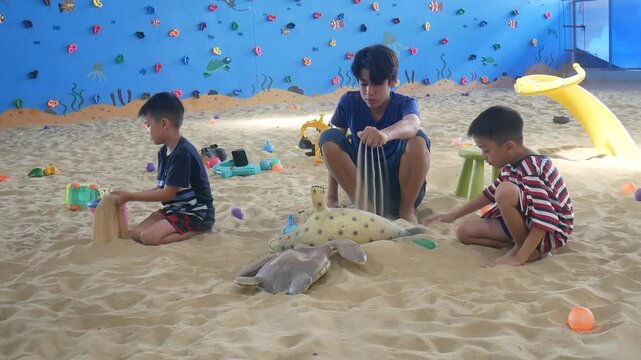 Children playing in the sand at the playground