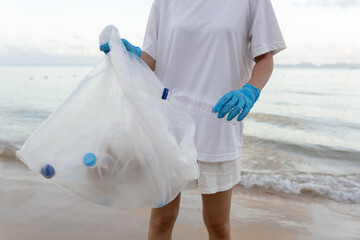 Save ocean. Volunteer pick up trash garbage at the beach and plastic bottles are difficult...